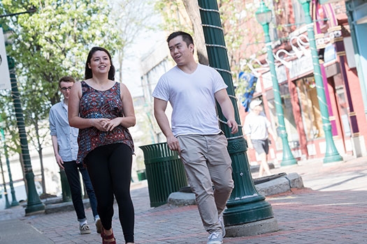 Three students strolling down Jay Street.