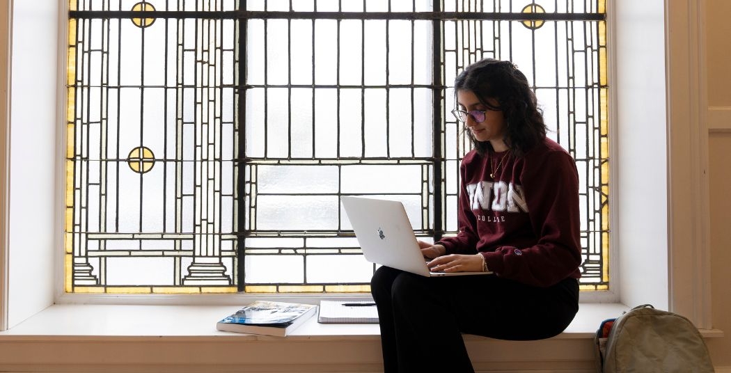 student working on computer