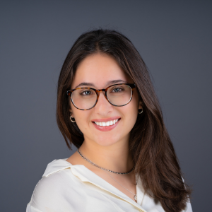 Professional headshot of Maddy Brand