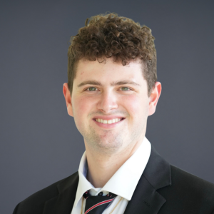 Professional headshot of Marcus Brem.