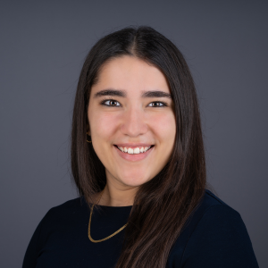 Professional headshot of Melanie De La Cruz